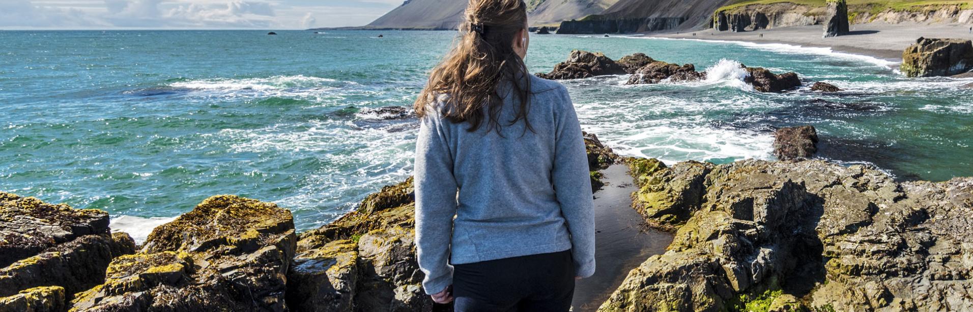 Women exploring the coast of Iceland.